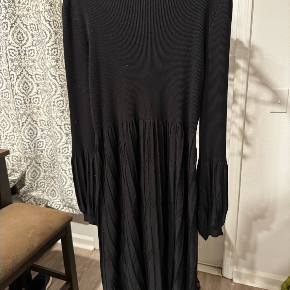 Draper James black with keyhole detail on sleeves and skirt